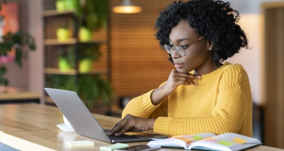 woman studing on a laptop